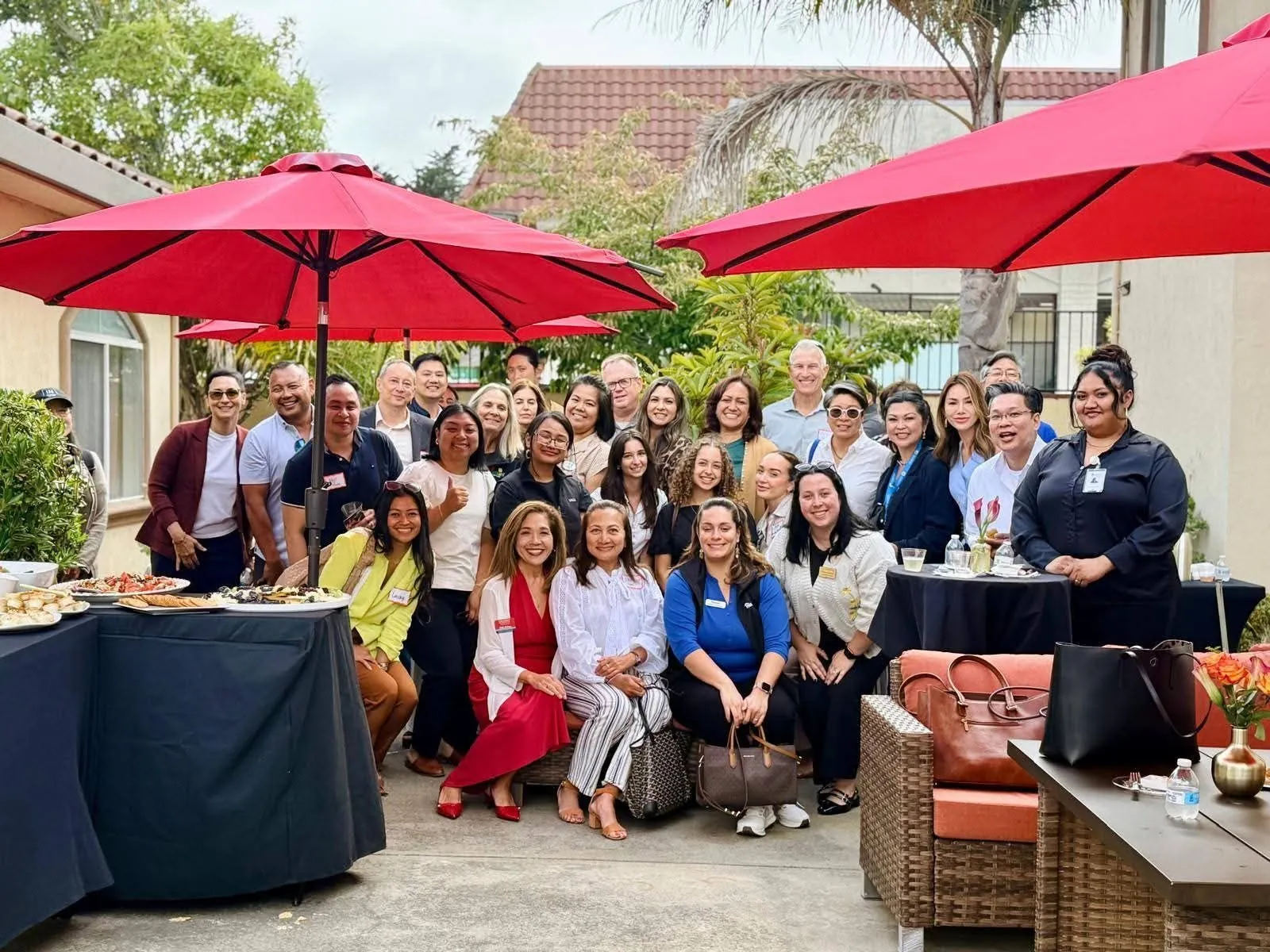 Lucky with senior-care professionals and community partners at The Mixer, Peninsula Reflections, August 2026